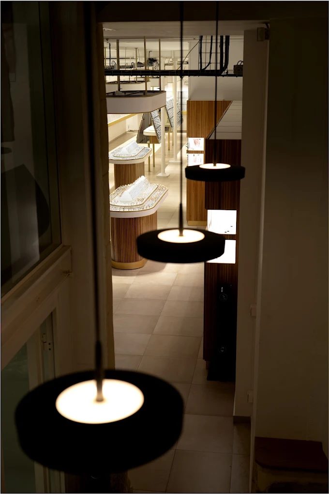 Jewellery displayed in a lit cabinet